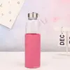Botella de vidrio de una sola capa nueva transfronteriza gran capacidad tapa de bambú taza de burbujas anti-quemaduras aislamiento térmico asa portátil taza acompañante para exteriores