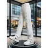 Jeans branco com respingos de grafite estilo americano de rua para homens, corte reto solto, marca da moda, legal e estiloso, novas calças de perna larga de outono
