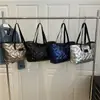 Bolsa de gran capacidad para chaqueta de plumón para mujer 2025 Nueva Otoño e Invierno Versátil Ins Nicho Bolso de mano Bolso tote de moda