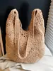 Bolsa Tejida Casual para Mujer Vacaciones de Verano en la Costa Nueva Moda 2025 Bolso de Paja Calado Gran Capacidad Bolso de Hombro Único para Mujer