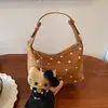 Bolso de axila tipo dumpling de lunares de nicho estilo coreano transfronterizo, bolso de hombro simple casual, bolso cruzado moderno, fresco y dulce