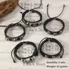 Pulsera popular de estilo punk exagerado para hombre, europea y americana, con accesorios de calavera y remaches, pulsera de conjunto multicapa