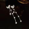 Pendientes retro de perlas francesas diseño femenino pendientes temperamento socialité 2025 nueva tendencia pendientes explosión venta al por mayor