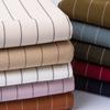 Tejido de ropa de rayas elásticas de alta calidad TR otoño e invierno pantalón de traje falda chaleco abrigo ropa tejido grueso