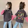 Camiseta de Manga Larga de Algodón Puro para Niñas Cuello Redondo Estampado de Dibujos Animados Estilo Nuevo 2026 Elegante Estilo Coreano Bloque de Color Camiseta Básica