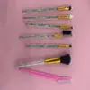 Set de siete brochas de maquillaje herramientas de belleza brocha para sombra de ojos brocha para rubor raspador de cejas cepillo para pestañas en espiral cepillo para cejas