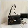 Bolsa Retro de Moda Transfronteiriça para Mulheres Inverno 2026 Nova Bolsa Versátil de Ombro Transversal Bolsa Tote de Alto Valor para o Dia a Dia