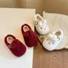Zapatos de felpa con orejas de conejo para niños, nuevo estilo de invierno 2026, zapatos de algodón para bebé tipo princesa de color liso, calzado cálido