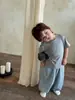 Camiseta de modal de color liso de manga corta para niños de verano, fina y fresca, de cuello redondo, ropa casual para el hogar con aire acondicionado para niños y niñas