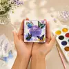 YUELU Mini Libro de Colorear Acuarela 70% de Descuento, Libro de Colorear Portátil Hecho a Mano para Alivio del Estrés con Pinturas Integradas y Páginas Perladas