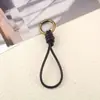 Llavero colgante de cuerda de cuero hecho a mano vintage colgante tejido cuerda para llaves de coche de piel cordón para billetera muñequera corta