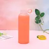 Fabricantes de comercio exterior nuevo silicona vidrio capa única cubierta de silicona todo incluido mango de vaso de vidrio tapa color sólido vidrio