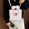 Mochila Feminina Estilo Moda para Ir ao Trabalho Fofa Duas Alças de Ombro de Mão Outono/Inverno Nova Ombro Único 2026 Diária Desenho Animado Transversal Retrô