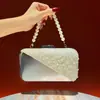 Nuevo bolso de mano para mujer, un clutch sofisticado con un toque de alta gama, versátil y exquisito, con una cadena de cuentas, un bolso de noche a la moda y un bolso cruzado para ocasiones formales