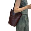 2025 nova bolsa de couro curtido vegetal de alta qualidade bolsa de couro de vaca bolsa balde tote preguiçosa retrô couro feminina uma geração de cabelo