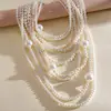Collar de perlas en capas con cuentas transfronterizo europeo y americano, cadena para la clavícula estilo fiesta vintage, lujo ligero, accesorio versátil de alta gama para mujer