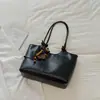 Bolso grande de mano estilo coreano para ir al trabajo, nuevo y moderno bolso de hombro de moda para el verano de 2026 con un estilo relajado