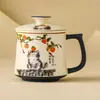 Taza de té de cerámica de alta gama del fabricante con tapa, Taza maestra para uso en la oficina, Taza con separación de té y agua, Taza individual