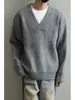 Nova coleção outono/inverno 2025: Suéter de tricô casual retrô americano, gola V de caimento relaxado, peça de outer wear de cor sólida para homens