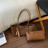 Bolsa Tote de Verão Vazada para Axila Feminina 2026 Novo Modelo de Alta Qualidade Grande Capacidade Bolsa de Mão Mãe-Filha Versátil Bolsa de Ombro