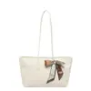 Bolsa de gran capacidad 2026 nueva moda bandolera texturizada color sólido bolsa de mujer bolsa de mano simple bolsa grande para ir al trabajo