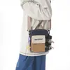 Bolso bandolera casual de moda con una textura simple, nuevo bolso para teléfono móvil, bolso de mujer moderno y único para el verano de 2026
