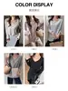 Camiseta cinza de manga comprida estilo coreano para mulheres, com um visual sofisticado, bordas dobradas, corte solto e efeito emagrecedor; uma camada base simples, de cor sólida e versátil