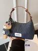 Bolso de mezclilla exquisito y moderno de nicho para mujer, nuevo bolso cruzado versátil de moda 2025, bolso de mano pequeño para salidas
