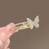 Nuevo Pasador de Pelo de Diamante Dulce de Alto Sentido Elegante Lujo Mariposa Pasador de Pelo Moda Flequillo Lateral Roto Pin de Pato