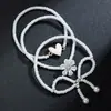 Moda Creativa Dulce Cuentas de Arroz Blanco Perla de Imitación Trenzado Lazo Flor Aleación Amor Elástico Pulsera para Dama