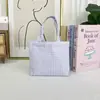 Bolso tote pequeño de cuadros nuevo, gran capacidad, bolsa gruesa para lonchera, simple y artístico, adecuado para el uso diario de estudiantes, bolso de tela de mano