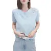 Camisa de punto de manga corta versátil, suave y cómoda, con un diseño único y exquisito de crochet calado, para el trayecto diario de verano transfronterizo 2025