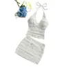 Nuevo top de verano sexy para mujer para vacaciones con tela texturizada y cuello halter, combinado con una falda de color liso