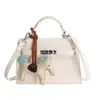 Bolsa feminina elegante e versátil para o dia a dia, novo modelo 2026, bolsa de mão de nicho coreana, bolsa Kelly, bolsa Birkin, transfronteiriça