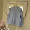 Camisa de Rayas Verticales con Bordado de Bolsillo Estilo Coreano Nueva para Primavera para Mujer, Blusa Elegante y Casual de Corte Holgado para el Trabajo y el Ocio, Transfronteriza