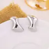 Pendientes Irregulares Geométricos de Moda Europea y Americana con Galvanoplastia de Oro Real Pendientes de Lujo Ligero de Nicho Pendientes de Venta Caliente Transfronteriza