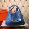 Bolsas de medicina al por mayor bolsas para mujer cuero de capa superior con textura de lichi bolsa de enfermera hombro portátil bolsa Lindi bolsa almohada Europa y Estados Unidos