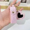 Llavero de Bolsita para Labial Transfronteriza, Fácil de Llevar, Bolsita para Labial con Lentejuelas y Brillo con Espejo, Colgante de Bolsa, Bolsita para Labial