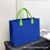 Bolsas de fieltro personalizadas con logo impreso para eventos promocionales corporativos, bolsas de almacenamiento de fieltro de gran capacidad