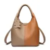 Bolso de mujer transfronterizo 2026 nueva moda versátil con bloques de color tipo cesta bolso de mano elegante bolso de hombro cruzado