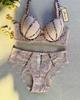 25 anos novo estampa de leopardo cor contrastante renda fina bojo moldado plus size lingerie aro de aço conjunto de sutiã com aro para realçar o busto