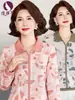 Ropa para mujeres de mediana edad y mayores colección otoño 2026 blusa estampada manga larga cuello camisero elegante talla extra ropa de madre camisa base camiseta