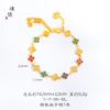 Tienda de oro con pulsera de azúcar Ruyi cuatro en uno de oro arena, nueva joyería de diseño nicho de lujo ligero retro chino para mujer