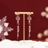 Pendientes de Perlas con Lazo Rojo para Otoño e Invierno Pendientes de Alta Gama para Mujer 2025 Nuevo Estilo Chino Pendientes Rojos