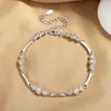 Pulseira de Osso Exquisita e de Luxo para Mulheres, Design de Nicho Estilo Ins Personalizado, Joia de Mão Versátil com Zircônia Incrustada Atacado