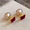 Aretes de Perlas Red Velvet de Año Nuevo para Mujer, Nuevo Estilo Popular 2026, Lujo Ligero con un Toque Único de Alta Gama