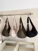 Bolsa tote de gran capacidad, bolsa versátil y elegante con forma de dumpling para mujer, nueva colección otoño 2026, bolso cruzado de un solo hombro casual y relajado