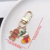 Nuevo KC Dorado/Blanco K Navidad Aceite Dibujo Animado Lindo Llavero Personalidad Creativa Joyería de Navidad Accesorios para Llavero