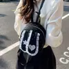 Mochila de conejo de orejas caídas con lunares de encaje dulce estilo coreano, femenina y elegante, mochila pequeña de moda de alta apariencia para el día a día