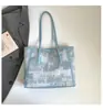 Bolsa Tote de Brim Lavado Grande Capacidade para Mulheres 2026 Nova Bolsa de Ombro para o Trabalho Bolsa de Mão Versátil de Alta Qualidade